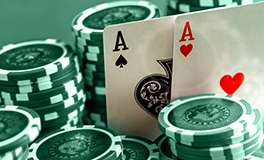 blackjack cards and chips placed on a casino table